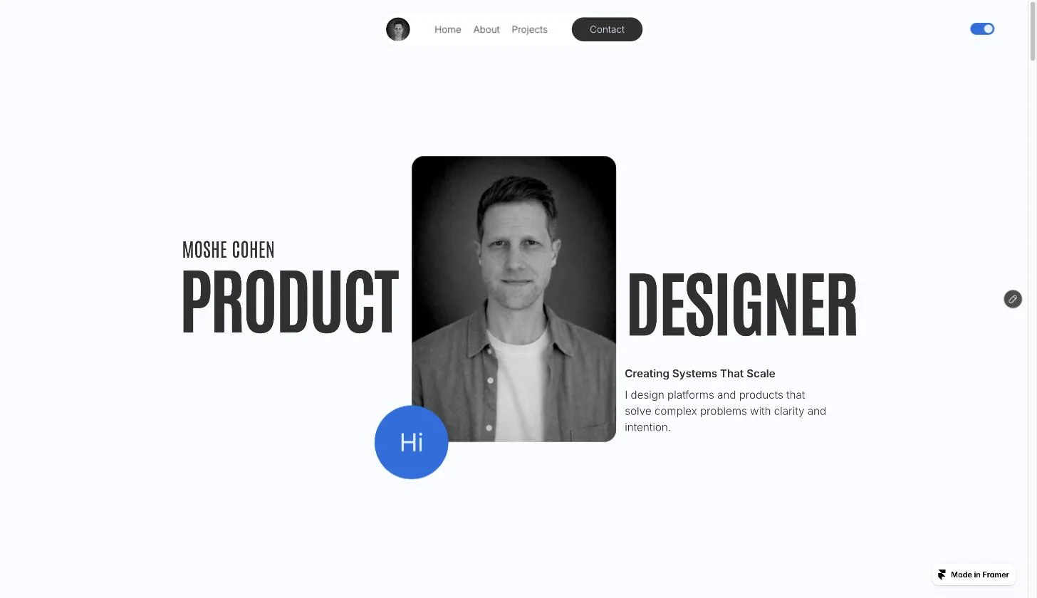 The old home page on Framer: large condensed display type around the portrait and a one-line tagline